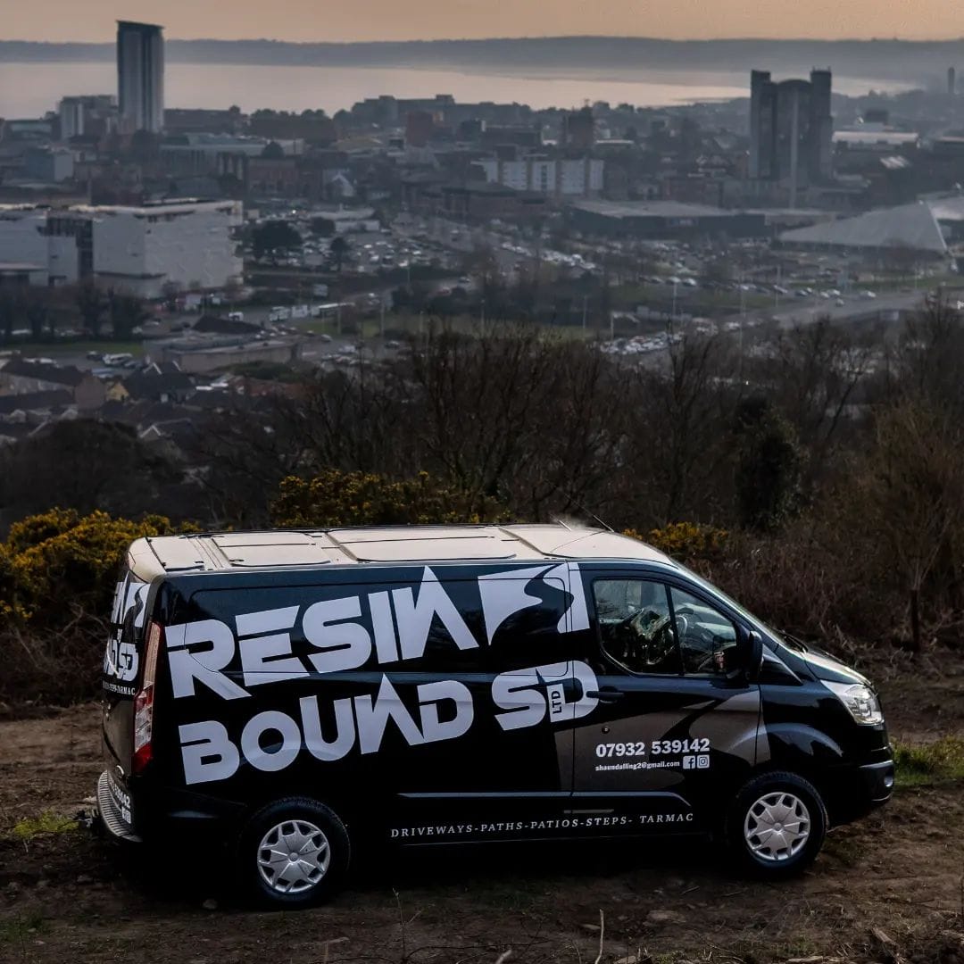 A photo of the Resin Bound by SD van parked and looking over Swansea City