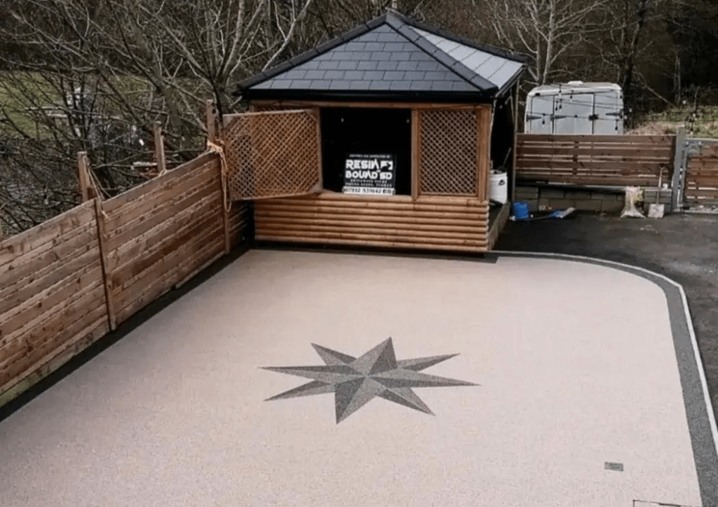 A resin bound patio with a centre star feature