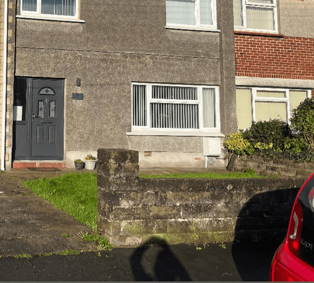 Before photo of a wall project in Swansea